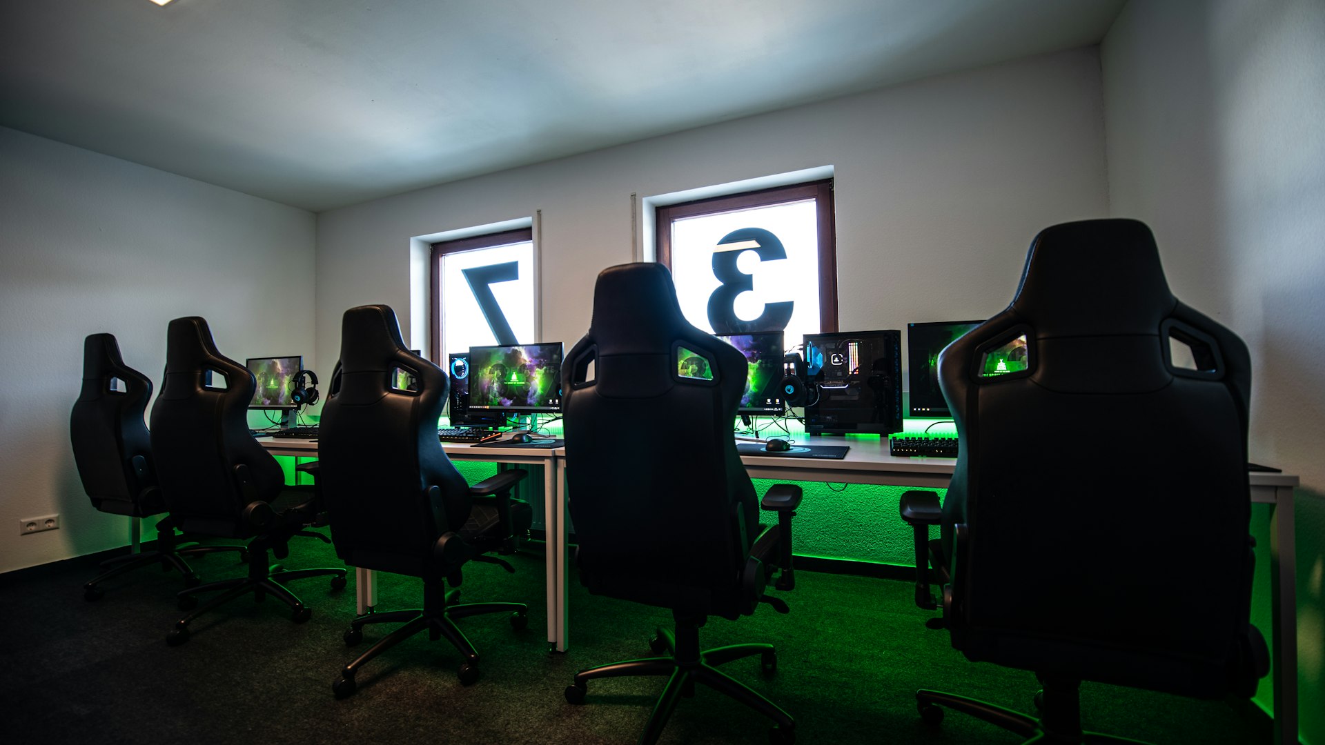 Players competing on the WarriorMatrixHub arena floor under tournament lighting